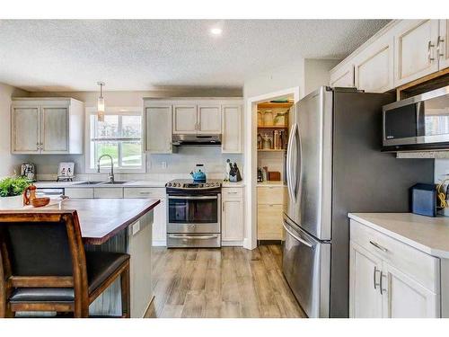 153 Arbour Wood Mews Nw, Calgary, AB - Indoor Photo Showing Kitchen