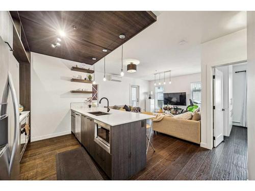 308-2702 17 Avenue Sw, Calgary, AB - Indoor Photo Showing Kitchen With Double Sink