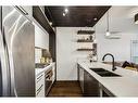 308-2702 17 Avenue Sw, Calgary, AB  - Indoor Photo Showing Kitchen With Double Sink With Upgraded Kitchen 