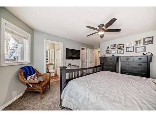 83 Sheep River Heights, Okotoks, AB - Indoor Photo Showing Bedroom