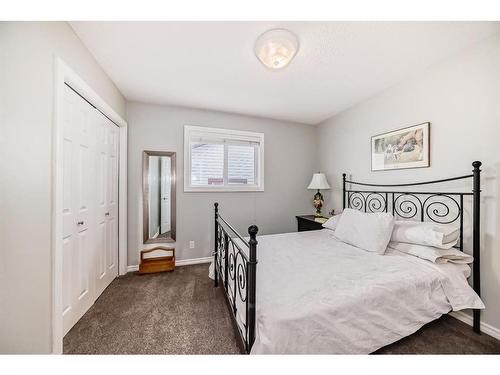 83 Sheep River Heights, Okotoks, AB - Indoor Photo Showing Bedroom