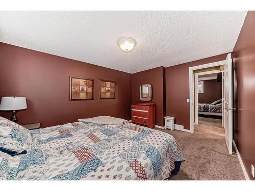 83 Sheep River Heights, Okotoks, AB - Indoor Photo Showing Bedroom