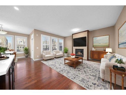 144 Mahogany Terrace Se, Calgary, AB - Indoor Photo Showing Living Room With Fireplace