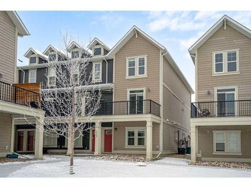 322 South Point Square Sw, Airdrie, AB - Outdoor With Balcony With Facade