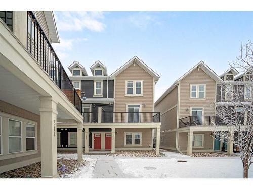 322 South Point Square Sw, Airdrie, AB - Outdoor With Balcony With Facade