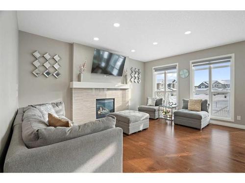 373 Nolan Hill Boulevard Nw, Calgary, AB - Indoor Photo Showing Living Room With Fireplace