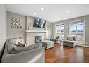 373 Nolan Hill Boulevard Nw, Calgary, AB  - Indoor Photo Showing Living Room With Fireplace 