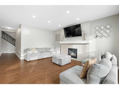 373 Nolan Hill Boulevard Nw, Calgary, AB - Indoor Photo Showing Living Room With Fireplace