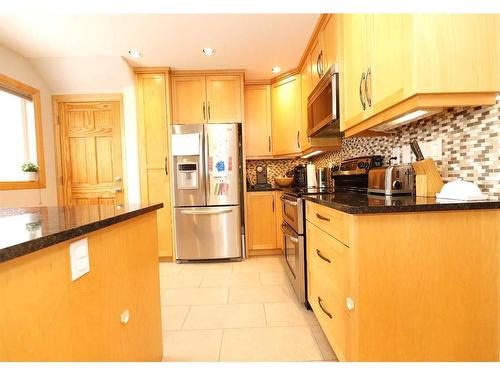 4417 Quentin Court Sw, Calgary, AB - Indoor Photo Showing Kitchen