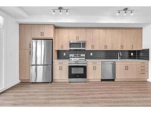 216-60 Sage Hill Walk Nw, Calgary, AB - Indoor Photo Showing Kitchen With Stainless Steel Kitchen