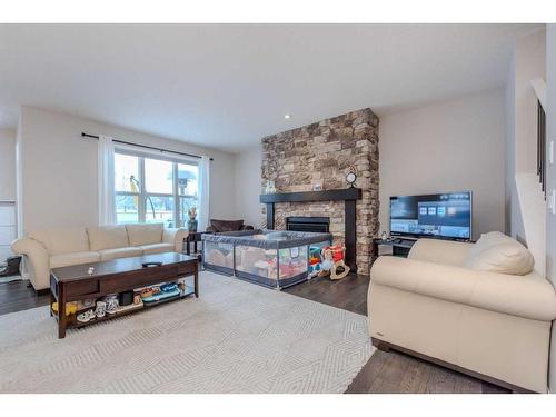 39 Legacy Glen Terrace Se, Calgary, AB - Indoor Photo Showing Living Room With Fireplace