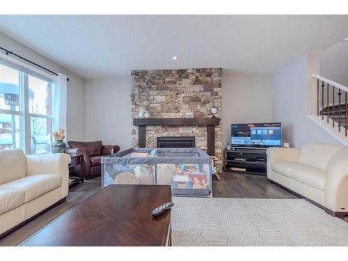 39 Legacy Glen Terrace Se, Calgary, AB - Indoor Photo Showing Living Room With Fireplace