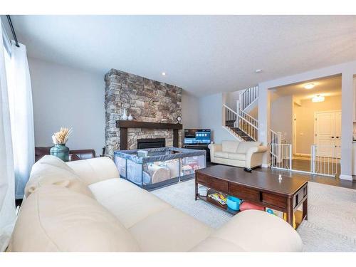 39 Legacy Glen Terrace Se, Calgary, AB - Indoor Photo Showing Living Room With Fireplace