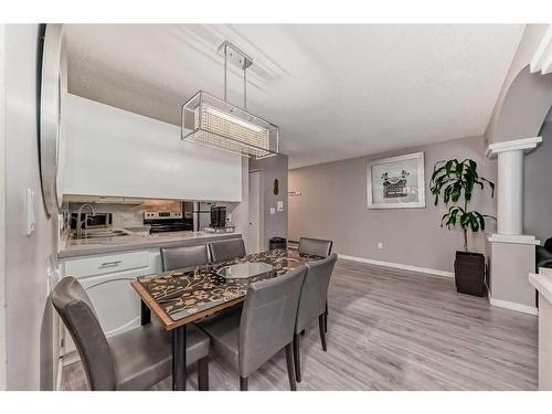 302-1001 68 Avenue Sw, Calgary, AB - Indoor Photo Showing Dining Room