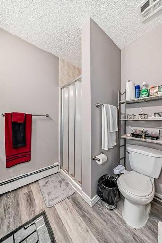 302-1001 68 Avenue Sw, Calgary, AB - Indoor Photo Showing Bathroom