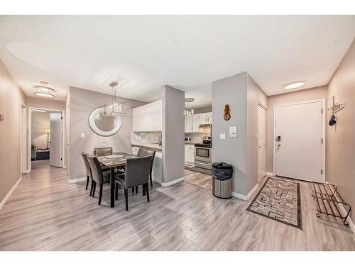 302-1001 68 Avenue Sw, Calgary, AB - Indoor Photo Showing Dining Room