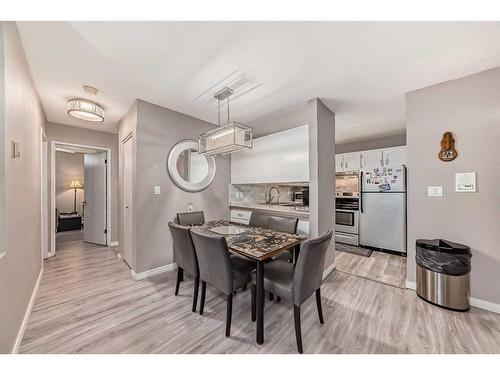 302-1001 68 Avenue Sw, Calgary, AB - Indoor Photo Showing Dining Room