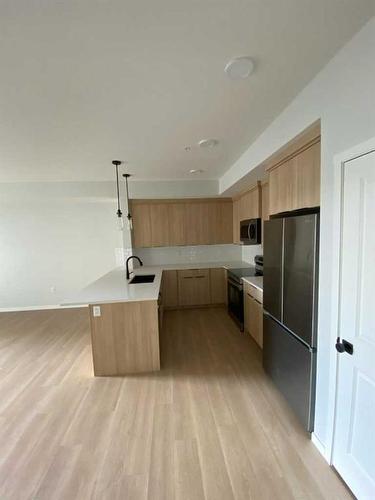 320-360 Harvest Hills Way Ne, Calgary, AB - Indoor Photo Showing Kitchen