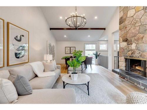 20 Varbay Place Nw, Calgary, AB - Indoor Photo Showing Living Room With Fireplace