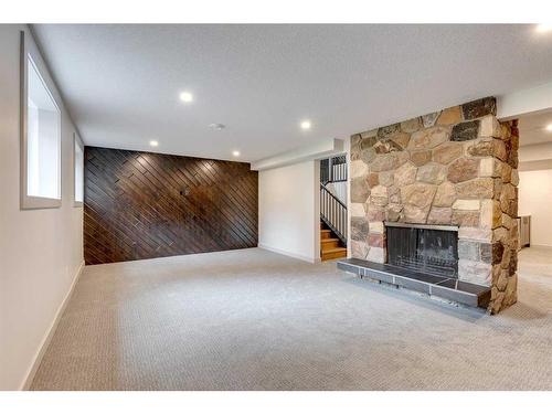 20 Varbay Place Nw, Calgary, AB - Indoor With Fireplace