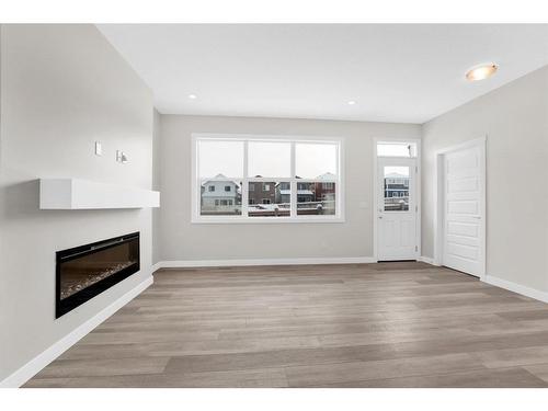 282 Homestead Terrace Ne, Calgary, AB - Indoor Photo Showing Living Room With Fireplace