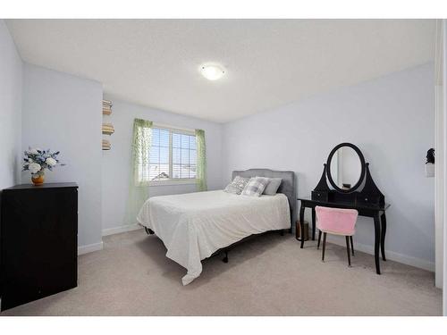 173 Rockyspring Grove Nw, Calgary, AB - Indoor Photo Showing Bedroom