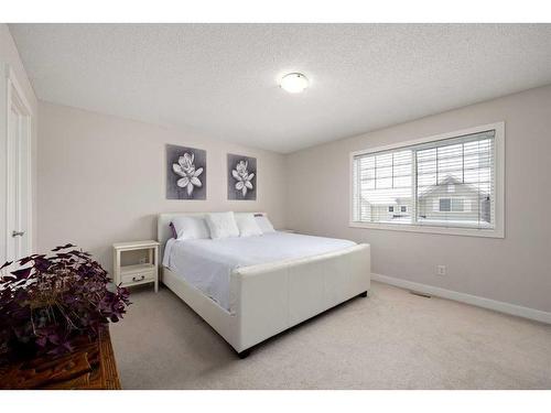 173 Rockyspring Grove Nw, Calgary, AB - Indoor Photo Showing Bedroom