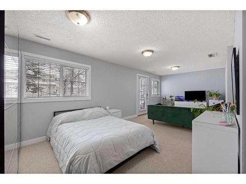 173 Rockyspring Grove Nw, Calgary, AB - Indoor Photo Showing Bedroom