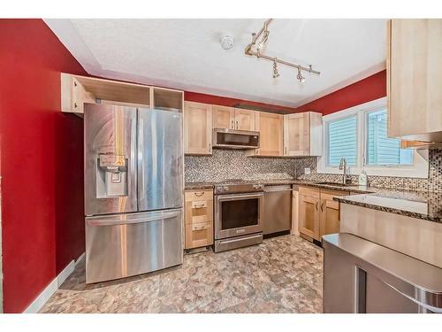 103 Waterloo Drive Sw, Calgary, AB - Indoor Photo Showing Kitchen