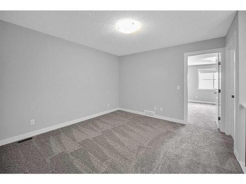 73 Herron Mews Ne, Calgary, AB - Indoor Photo Showing Other Room