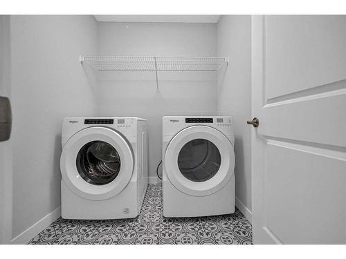 73 Herron Mews Ne, Calgary, AB - Indoor Photo Showing Laundry Room