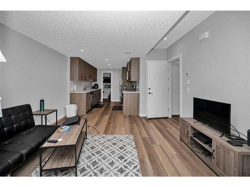 73 Herron Mews Ne, Calgary, AB - Indoor Photo Showing Living Room