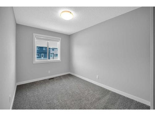 73 Herron Mews Ne, Calgary, AB - Indoor Photo Showing Other Room