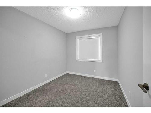 73 Herron Mews Ne, Calgary, AB - Indoor Photo Showing Other Room