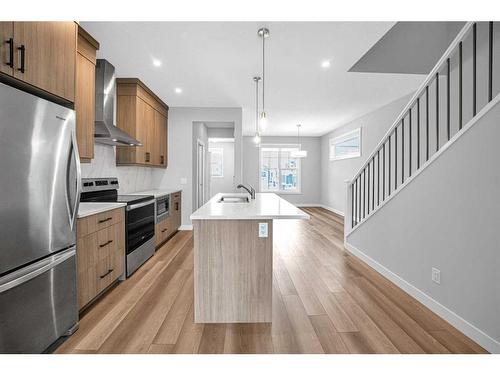 73 Herron Mews Ne, Calgary, AB - Indoor Photo Showing Kitchen With Stainless Steel Kitchen With Upgraded Kitchen