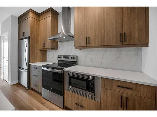 73 Herron Mews Ne, Calgary, AB - Indoor Photo Showing Kitchen With Stainless Steel Kitchen