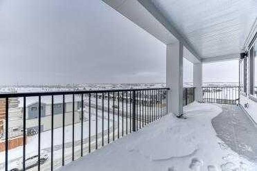 1409-111 Wolf Creek Drive Se, Calgary, AB - Outdoor With Balcony With Exterior