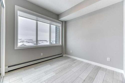 1409-111 Wolf Creek Drive Se, Calgary, AB - Indoor Photo Showing Other Room