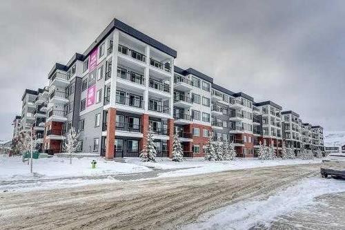 1409-111 Wolf Creek Drive Se, Calgary, AB - Outdoor With Balcony With Facade