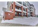 1409-111 Wolf Creek Drive Se, Calgary, AB  - Outdoor With Balcony With Facade 