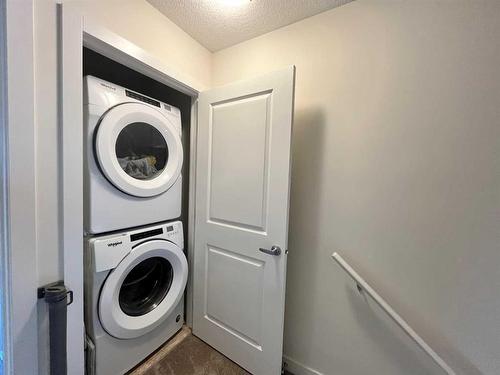 29 Legacy Path Se, Calgary, AB - Indoor Photo Showing Laundry Room