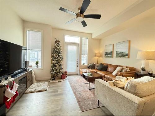 29 Legacy Path Se, Calgary, AB - Indoor Photo Showing Living Room