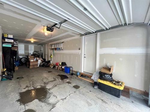 29 Legacy Path Se, Calgary, AB - Indoor Photo Showing Garage