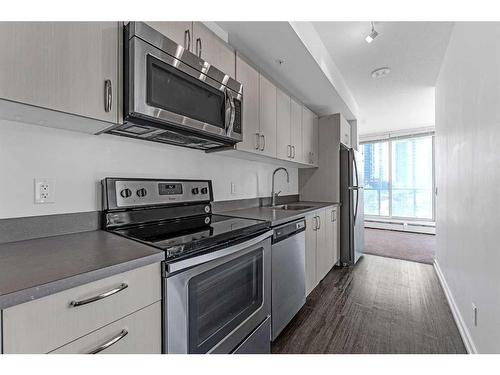 212-450 8 Avenue Se, Calgary, AB - Indoor Photo Showing Kitchen With Stainless Steel Kitchen