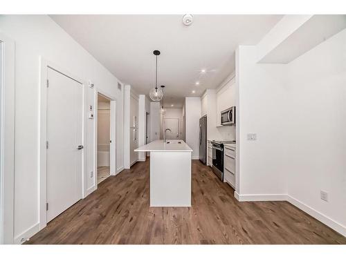 1201-111 Wolf Creek Drive Se, Calgary, AB - Indoor Photo Showing Kitchen