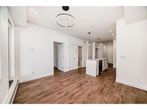 1201-111 Wolf Creek Drive Se, Calgary, AB - Indoor Photo Showing Kitchen