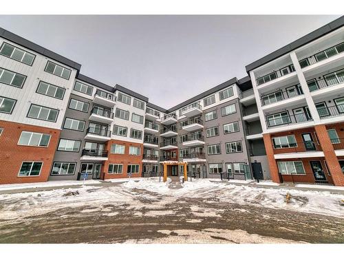 1201-111 Wolf Creek Drive Se, Calgary, AB - Outdoor With Balcony With Facade