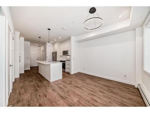 1201-111 Wolf Creek Drive Se, Calgary, AB - Indoor Photo Showing Kitchen