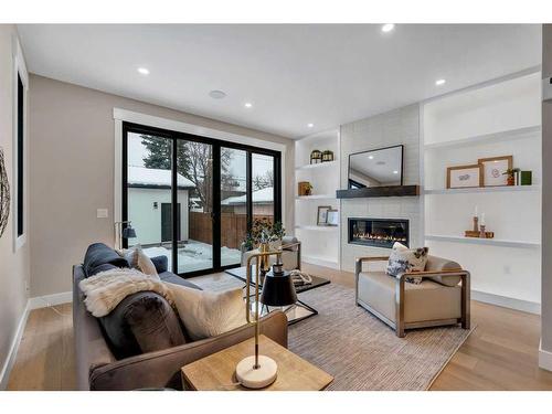 2332 Broadview Road Nw, Calgary, AB - Indoor Photo Showing Living Room With Fireplace