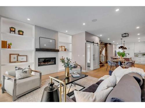 2332 Broadview Road Nw, Calgary, AB - Indoor Photo Showing Living Room With Fireplace